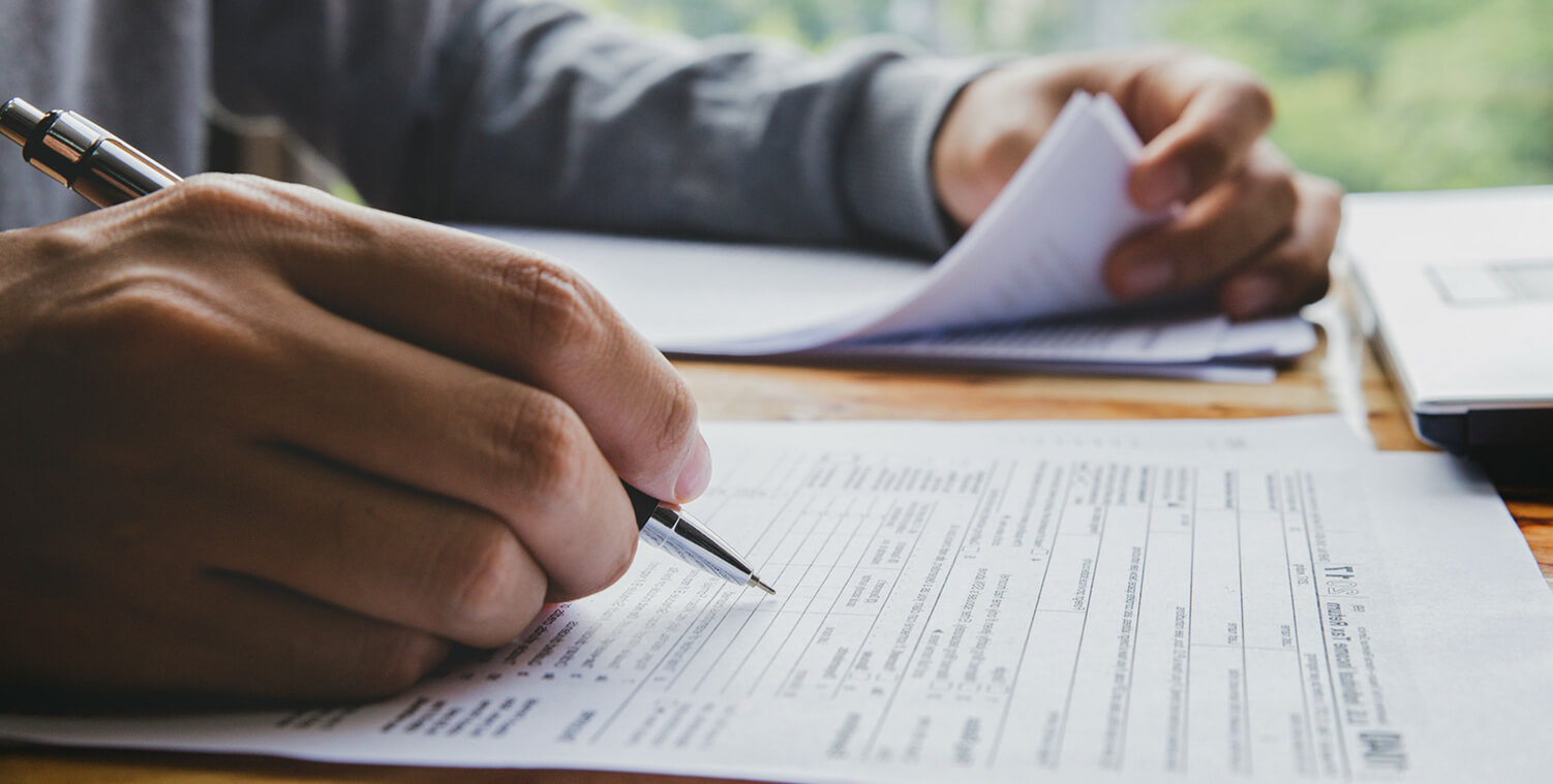 Man holding a pen